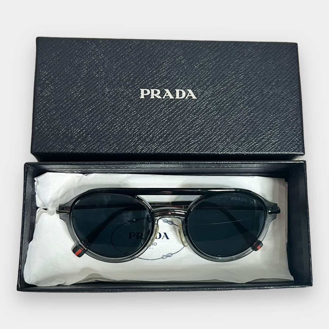 Prada Sunglasses - The Luxury Savvy