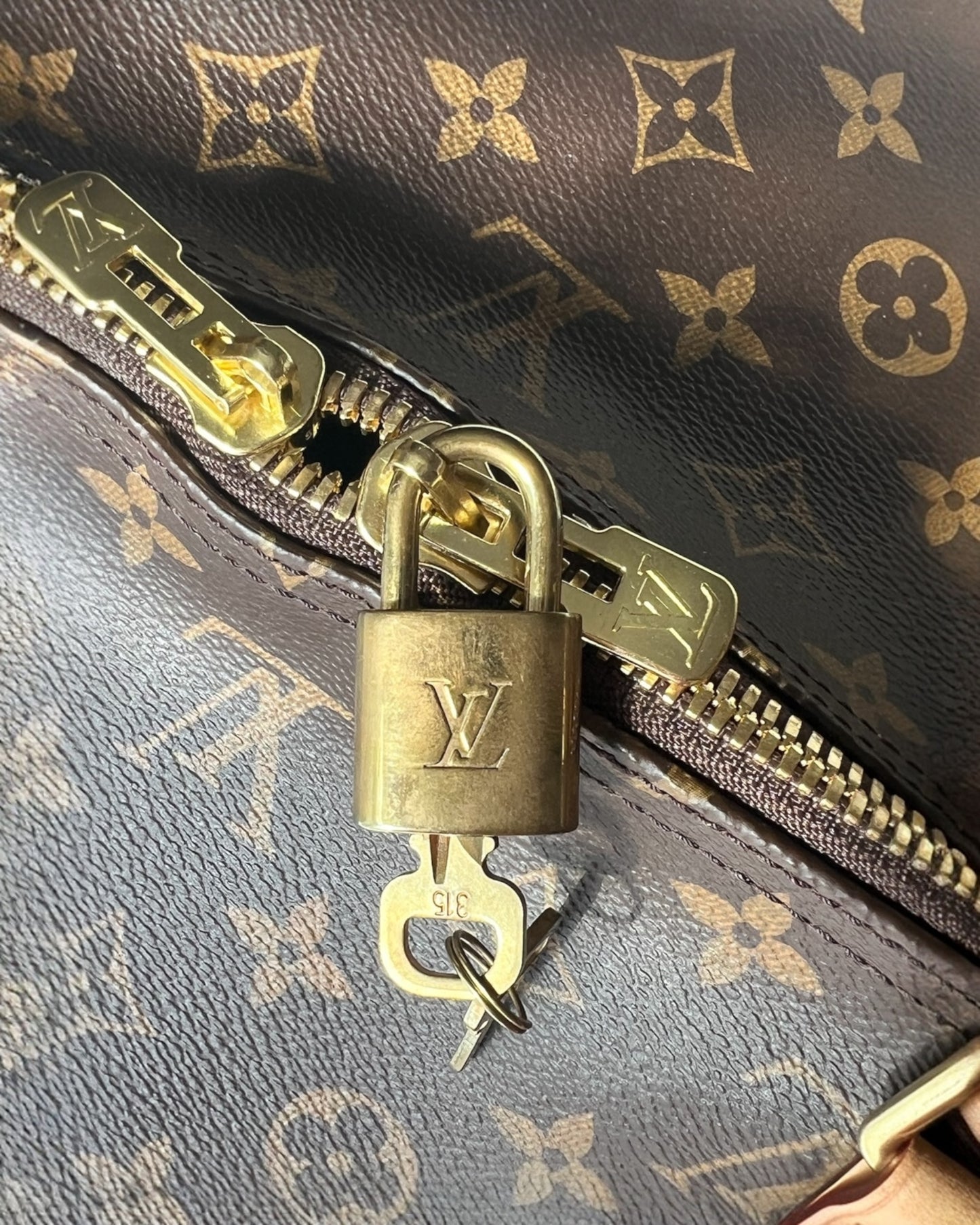 Louis Vuitton Keepall 55 Bandouliere - The Luxury Savvy