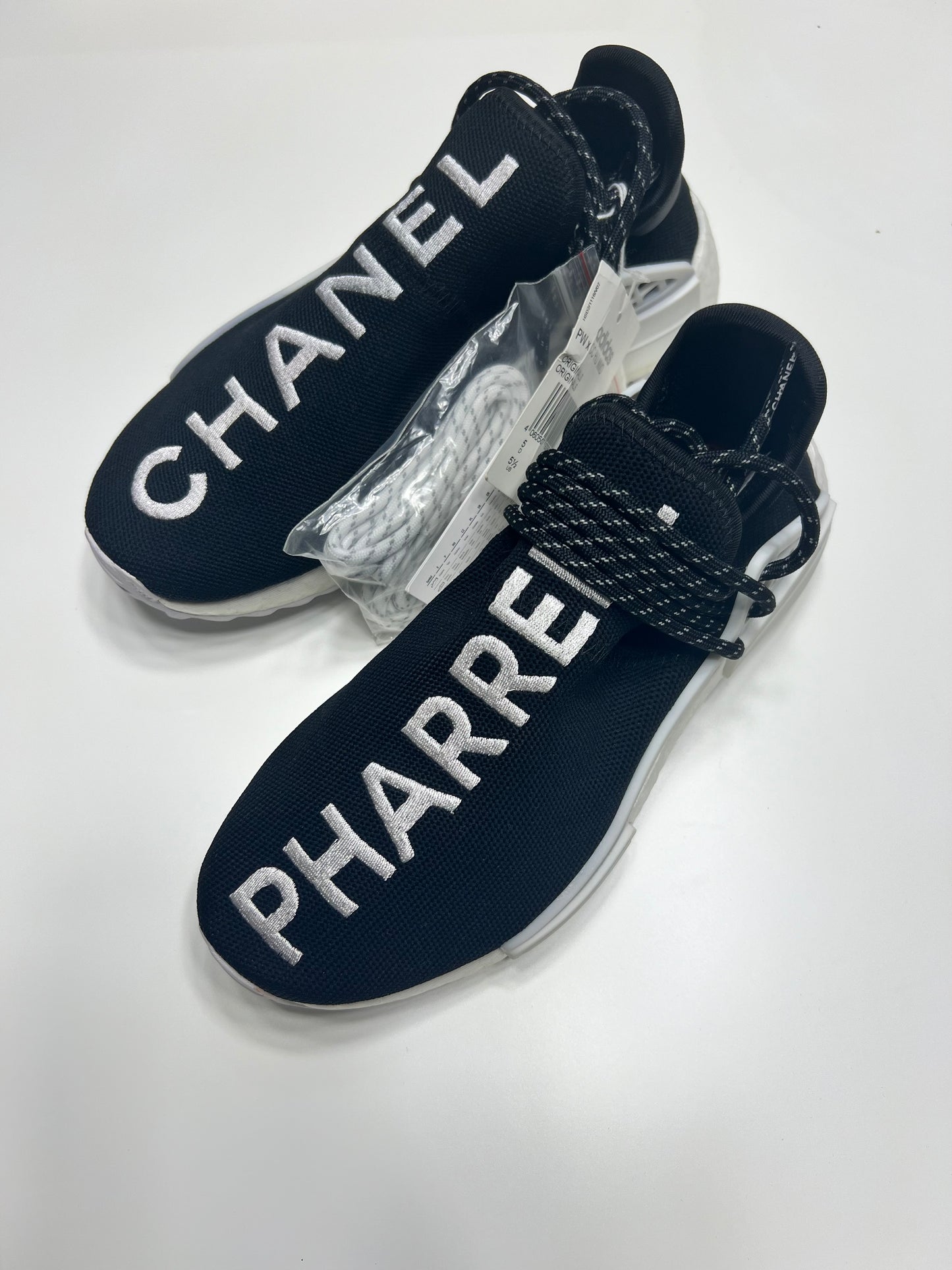 CHANEL X PHARRELL ADIDAS NMD HU 2018 - The Luxury Savvy